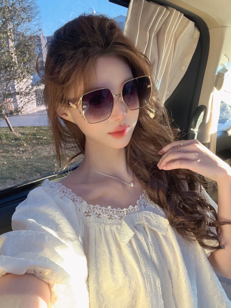 Miu miu Sunglasses